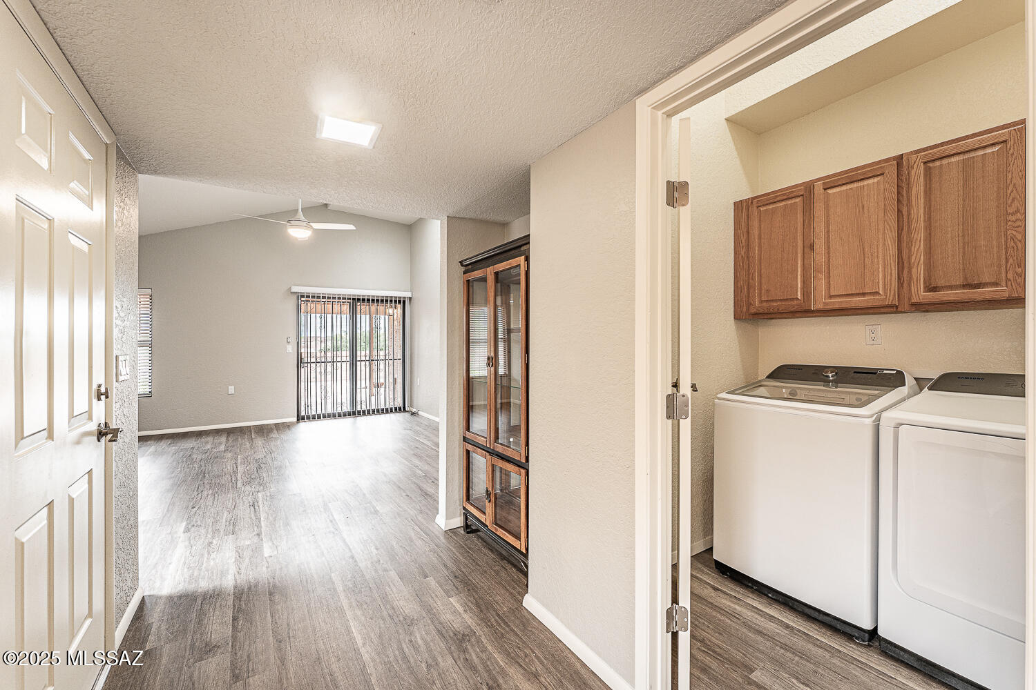 931 West Rio Guaymas Green Valley, AZ 85614 - Photo 15 of 39 a view of a kitchen with wooden floor and electronic appliances