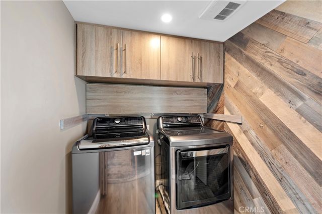 a kitchen with a stove and a sink