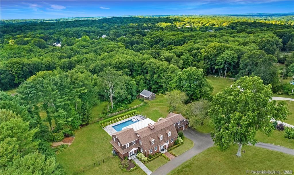 WELCOME HOME... this home is set back from the road and sits on a 1.73-acre level lot. Highly desirable location, close to center of town, beach, and highway.