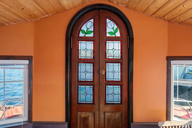 a bathroom with a sink a toilet and shower curtain