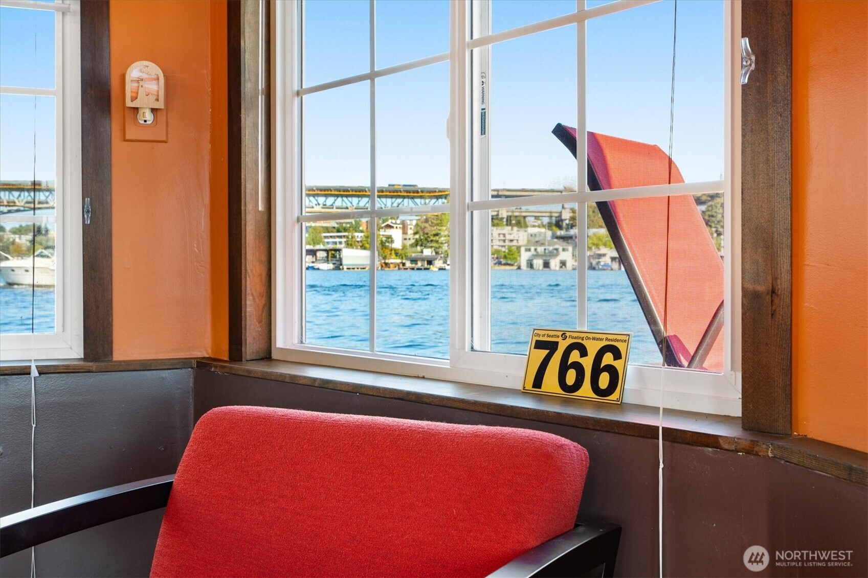 2401 North Northlake Way, Unit L6 Seattle, WA 98103 - Photo 20 of 30 a blue bed sitting in front of a window