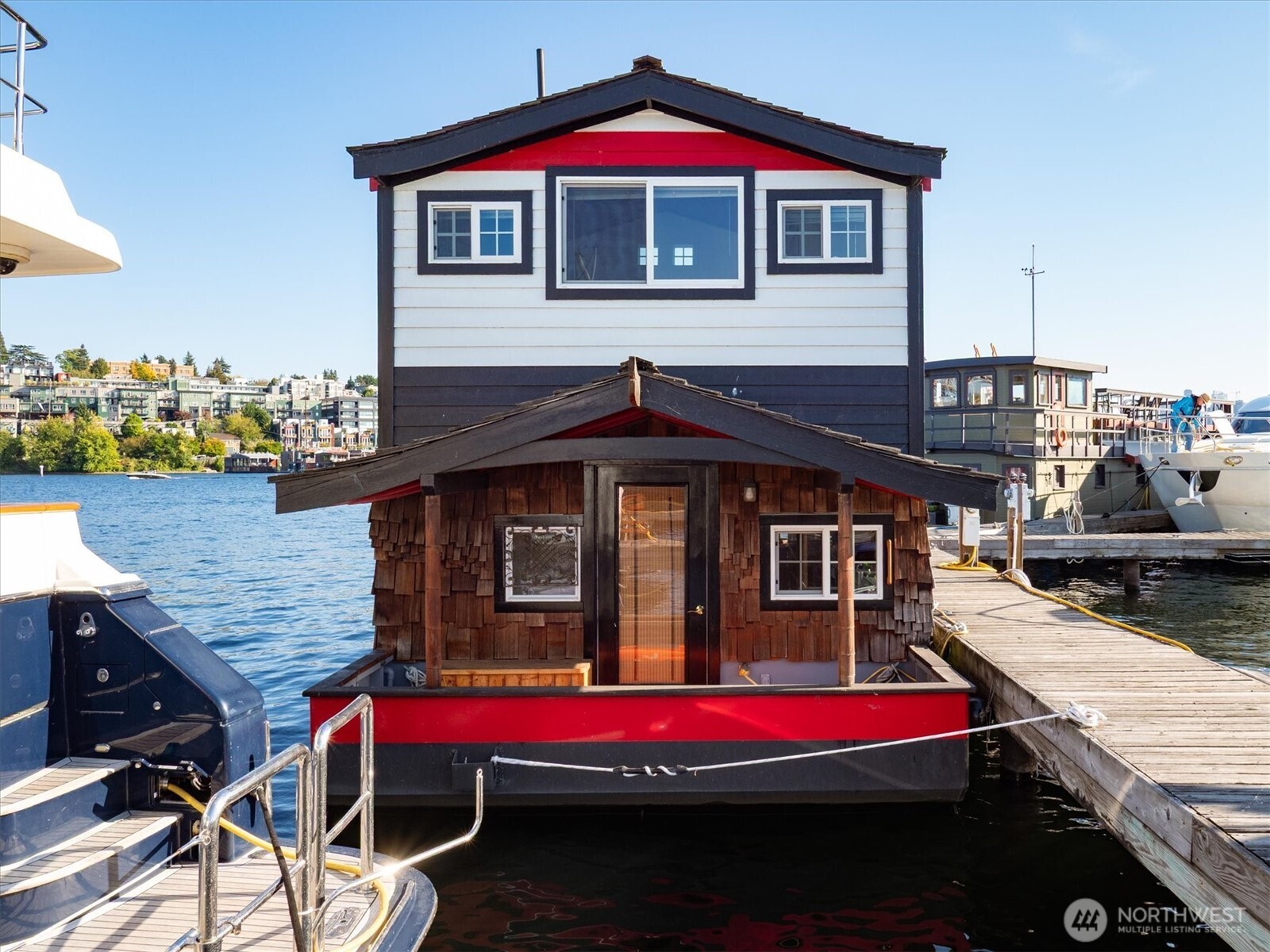 2401 North Northlake Way, Unit L6 Seattle, WA 98103 - Photo 27 of 30 a front view of a house with swimming pool