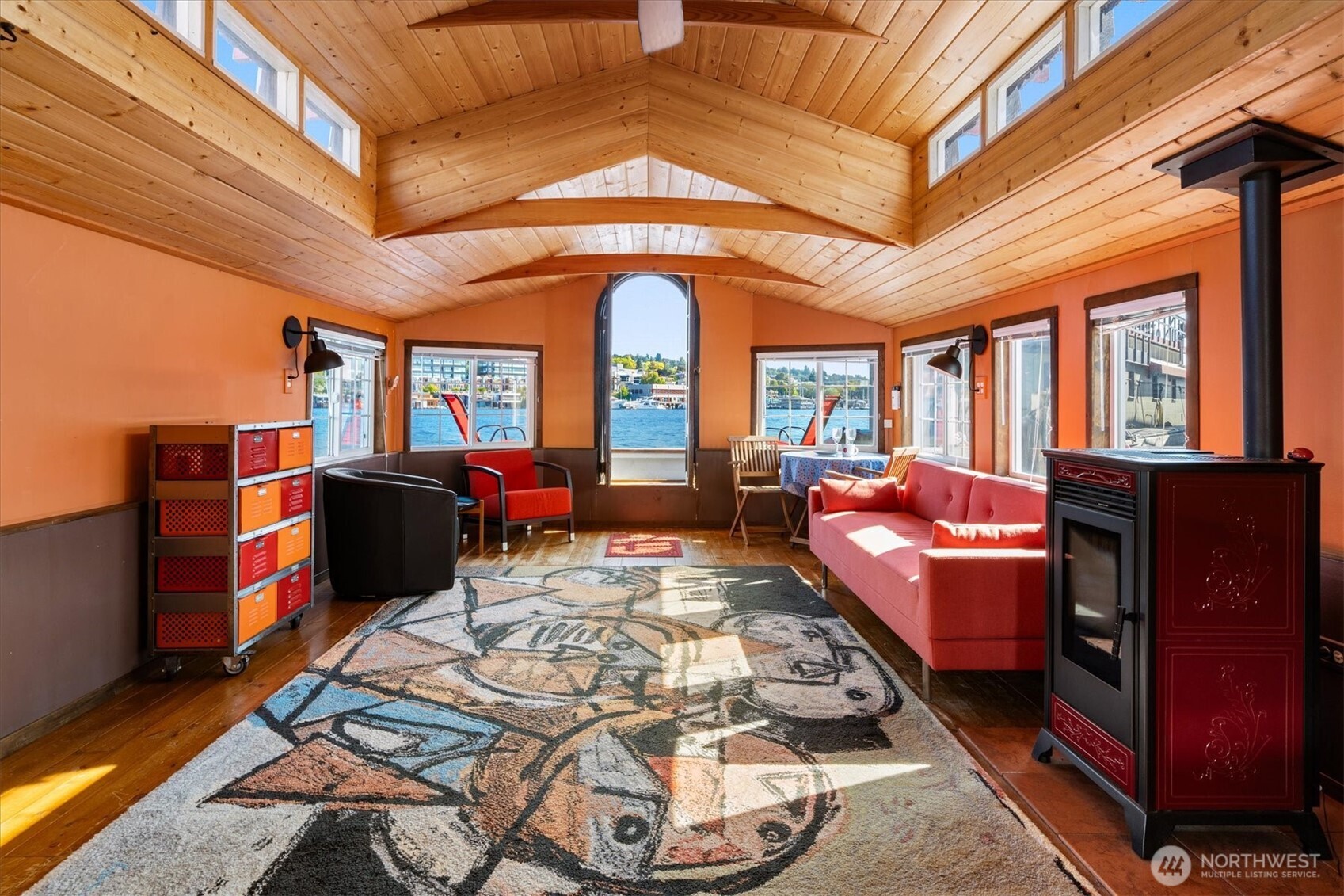 2401 North Northlake Way, Unit L6 Seattle, WA 98103 - Photo 4 of 30 a living room with furniture and a large window