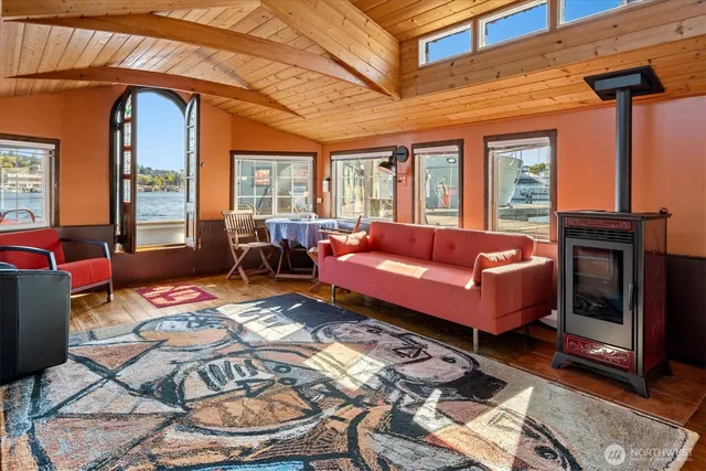 a outdoor living space with furniture and a fireplace