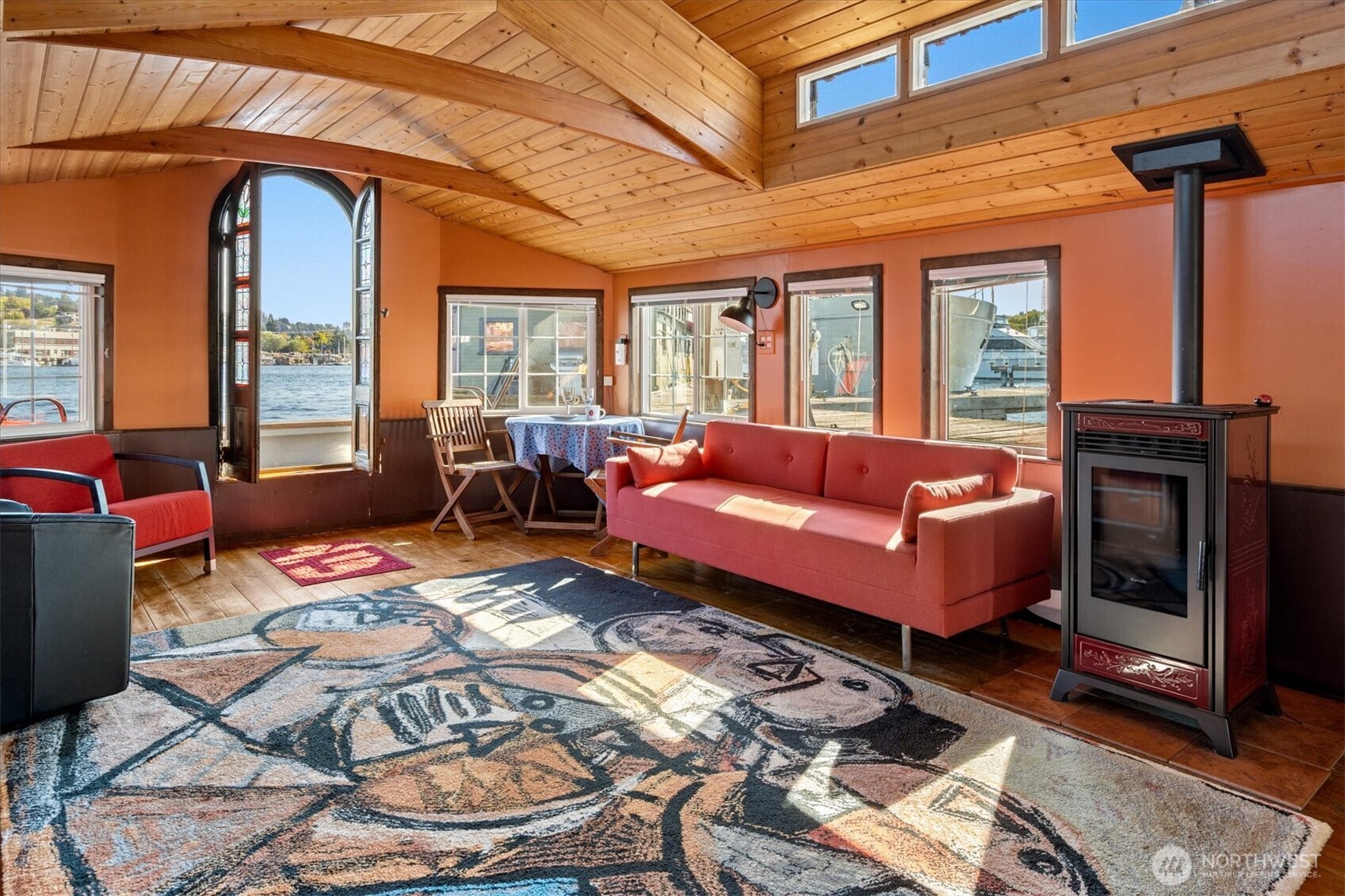 2401 North Northlake Way, Unit L6 Seattle, WA 98103 - Photo 5 of 30 a outdoor living space with furniture and a fireplace