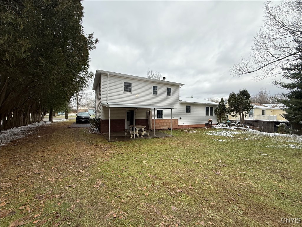 6086 Cavanaugh Road Marcy, NY 13403 - Photo 17 of 17 Backyard with covered area