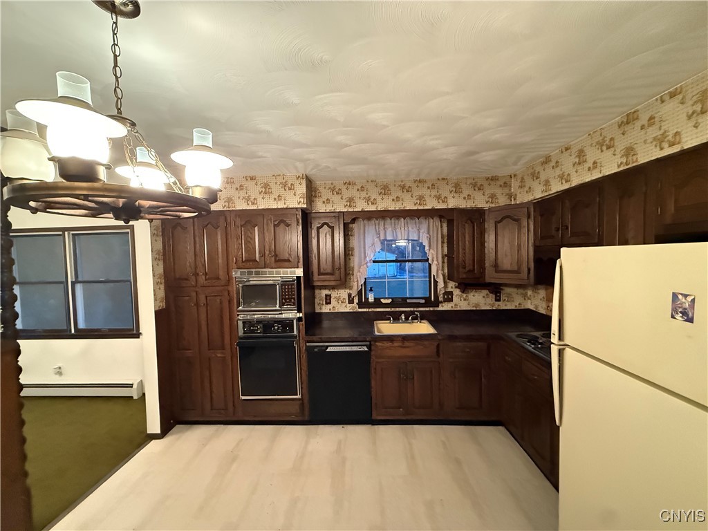 6086 Cavanaugh Road Marcy, NY 13403 - Photo 2 of 17 Kitchen with dining room entrance
