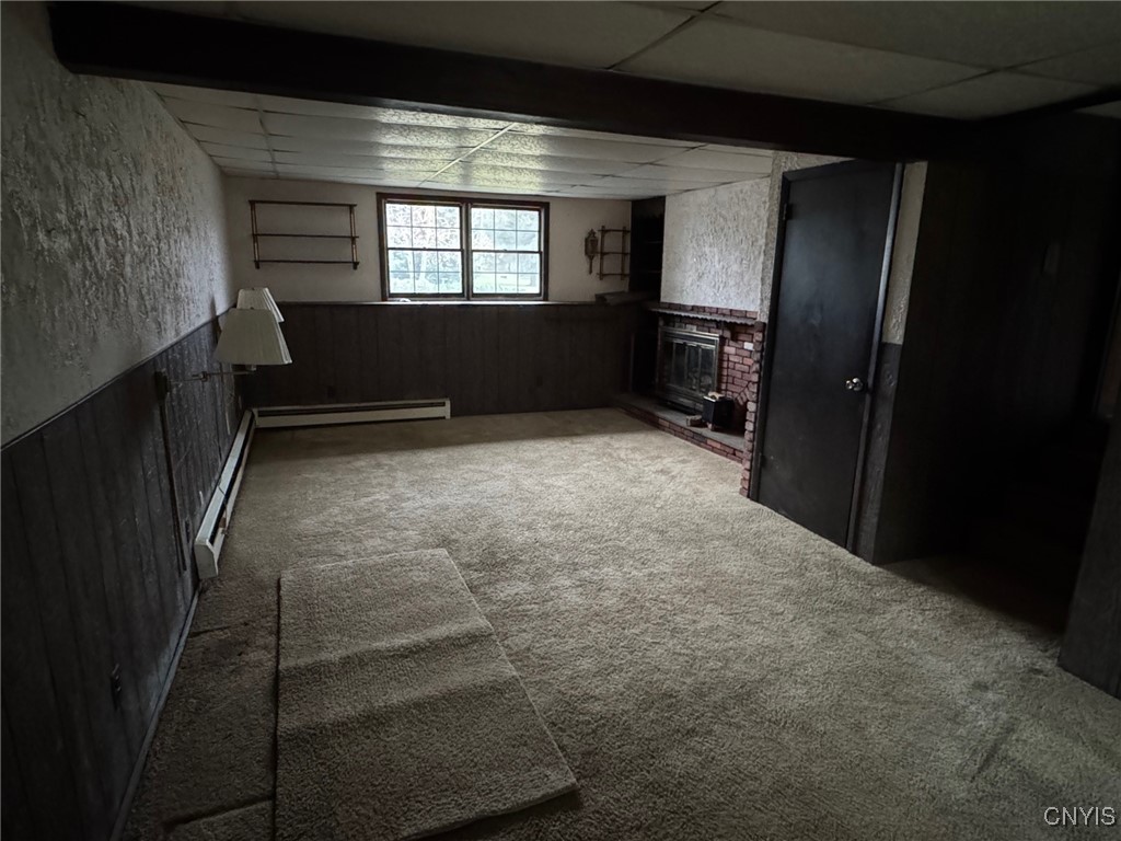 6086 Cavanaugh Road Marcy, NY 13403 - Photo 10 of 17 family room with fireplace in lower level