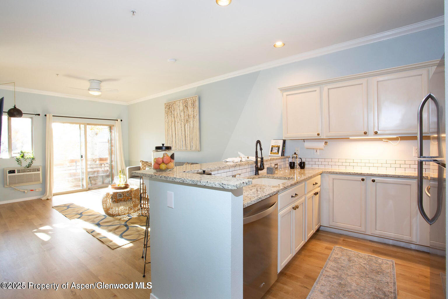 1400 East Valley Road, Unit 212 Basalt, CO 81621 - Photo 1 of 15 a kitchen with a sink stove and cabinets