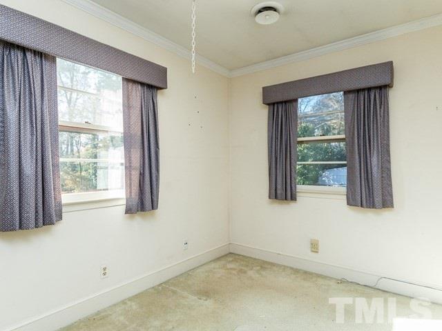 3513 Brook Drive Raleigh, NC 27609 - Photo 13 of 30 a view of an empty room with a window
