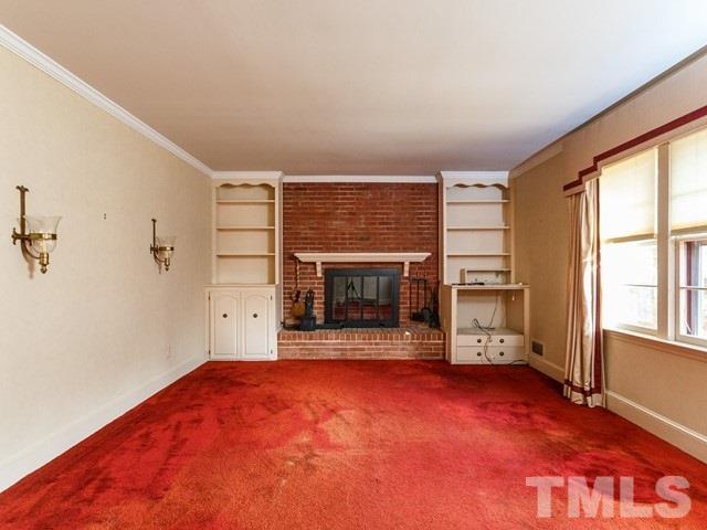 3513 Brook Drive Raleigh, NC 27609 - Photo 3 of 30 an empty room with windows