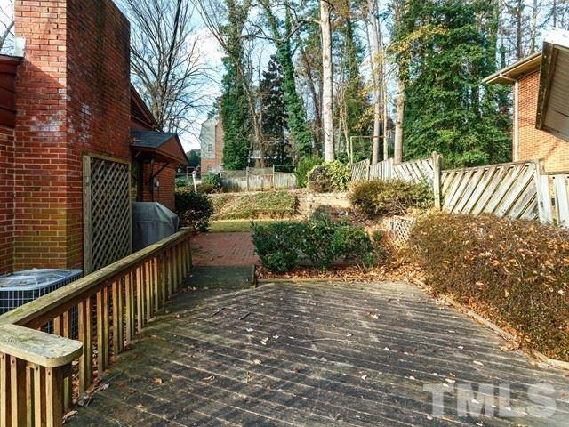 3513 Brook Drive Raleigh, NC 27609 - Photo 24 of 30 a view of a pathway of a house with a patio