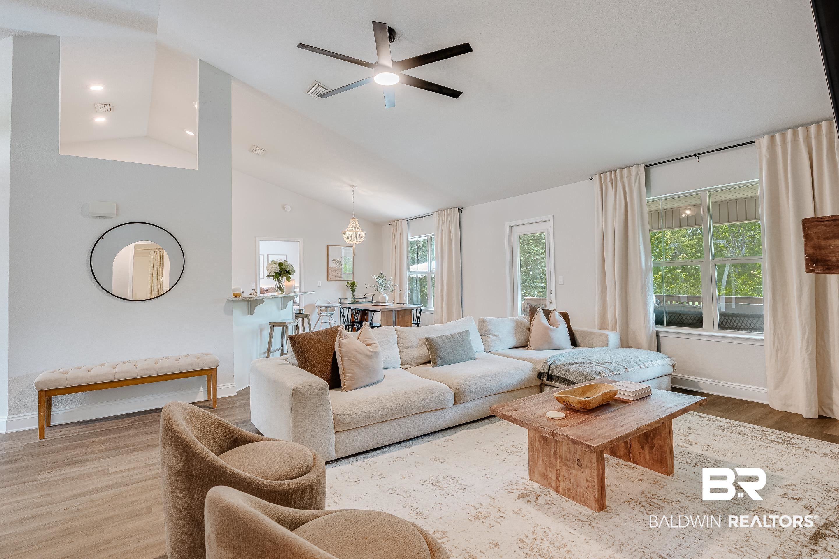 2215 Fernwood Loop West Semmes, AL 36575 - Photo 5 of 40 Spacious living area featuring a vaulted ceiling, wood-finish flooring, and recessed lighting