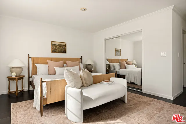 a bed room with a bed and a couch