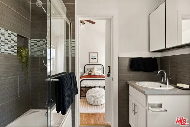 a bathroom with a sink and a mirror