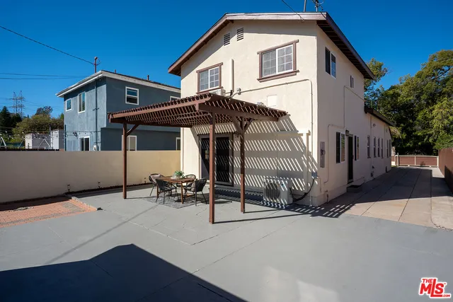 a front view of a house with garage