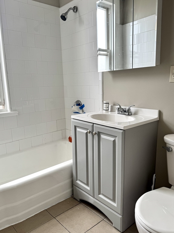 56 Estes Street, Unit 5 Lynn, MA 01902 - Photo 11 of 11 a bathroom with a sink toilet and bathtub