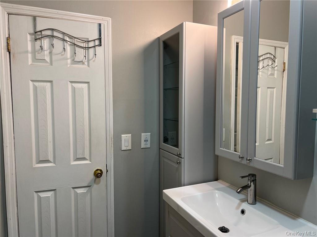 708 Silver Lake-Scotchtown Road Middletown, NY 10941 - Photo 17 of 25 Bathroom featuring vanity