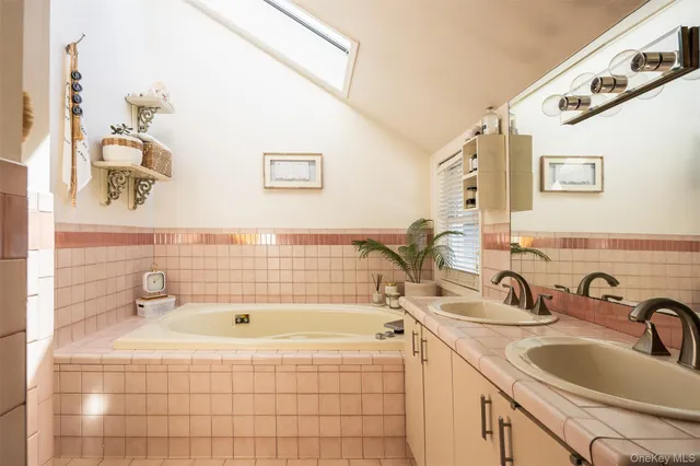 a bathroom with a sink and a bathtub
