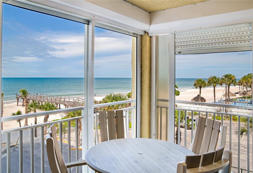 17450 Gulf Boulevard, Unit 206 Redington Shores, FL 33708 - Photo 14 of 52 a view of a balcony with furniture