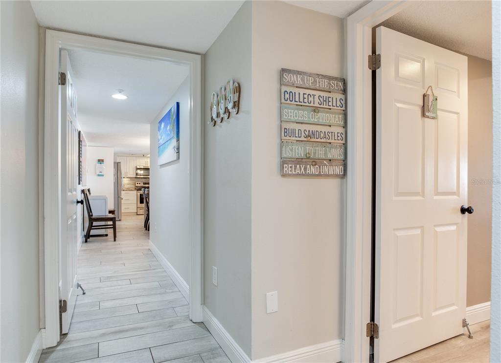 17450 Gulf Boulevard, Unit 206 Redington Shores, FL 33708 - Photo 39 of 52 a view of a hallway with closet and a livingroom view