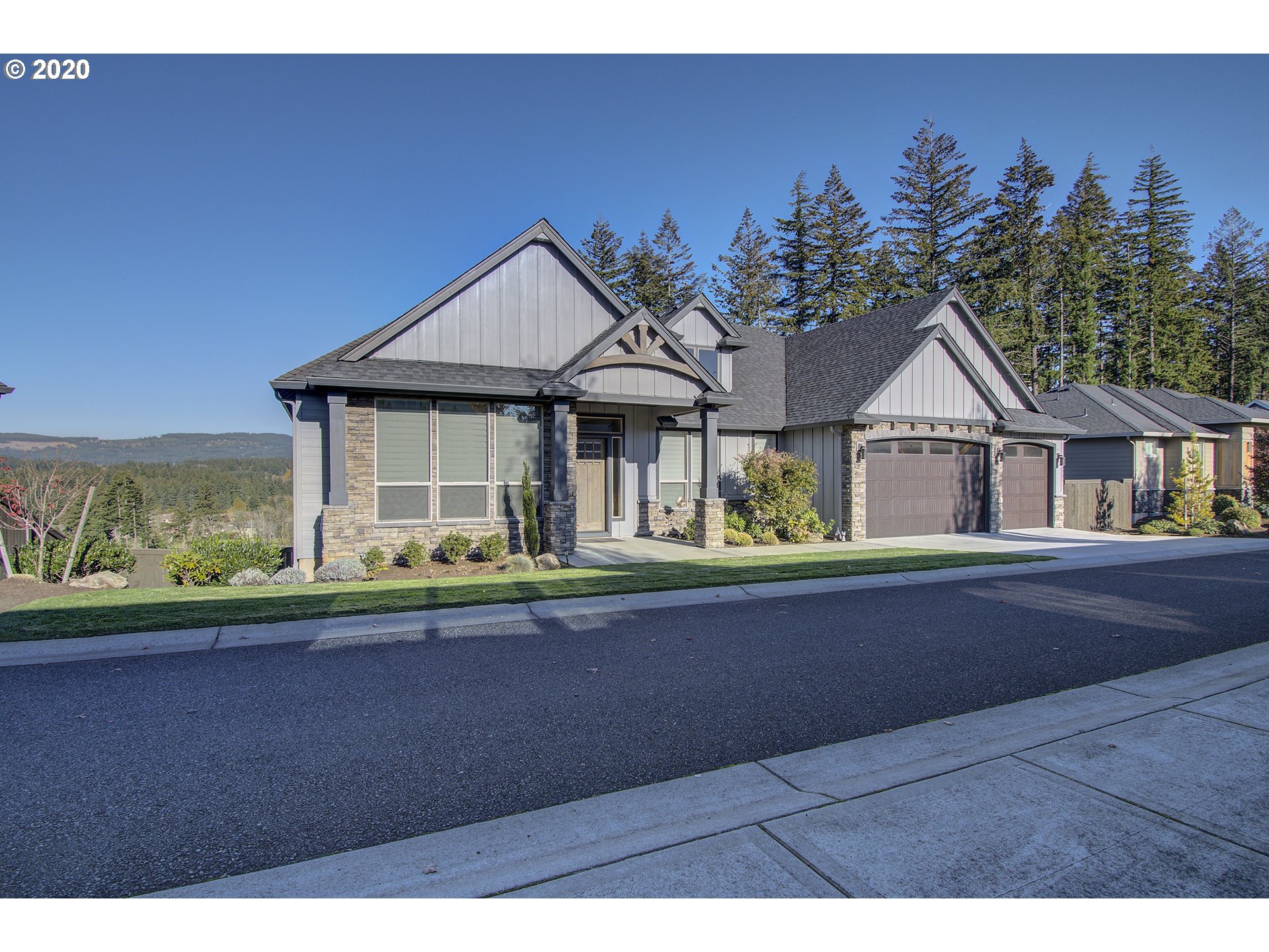 3221 Northwest Lake Place Camas, WA 98607 - Photo 1 of 32 a front view of a house with garden
