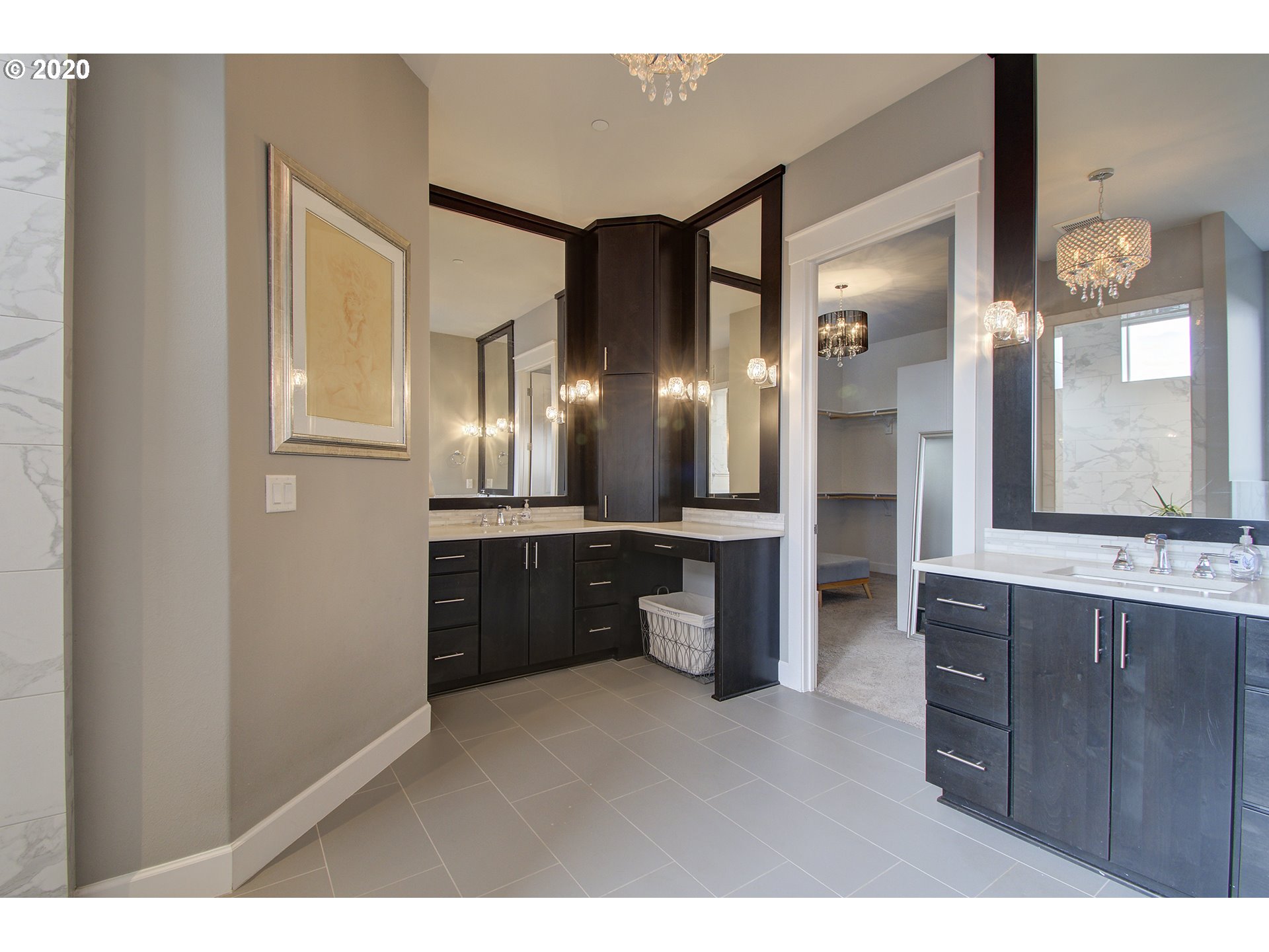 3221 Northwest Lake Place Camas, WA 98607 - Photo 13 of 32 a kitchen with stainless steel appliances kitchen island granite countertop a refrigerator and a sink