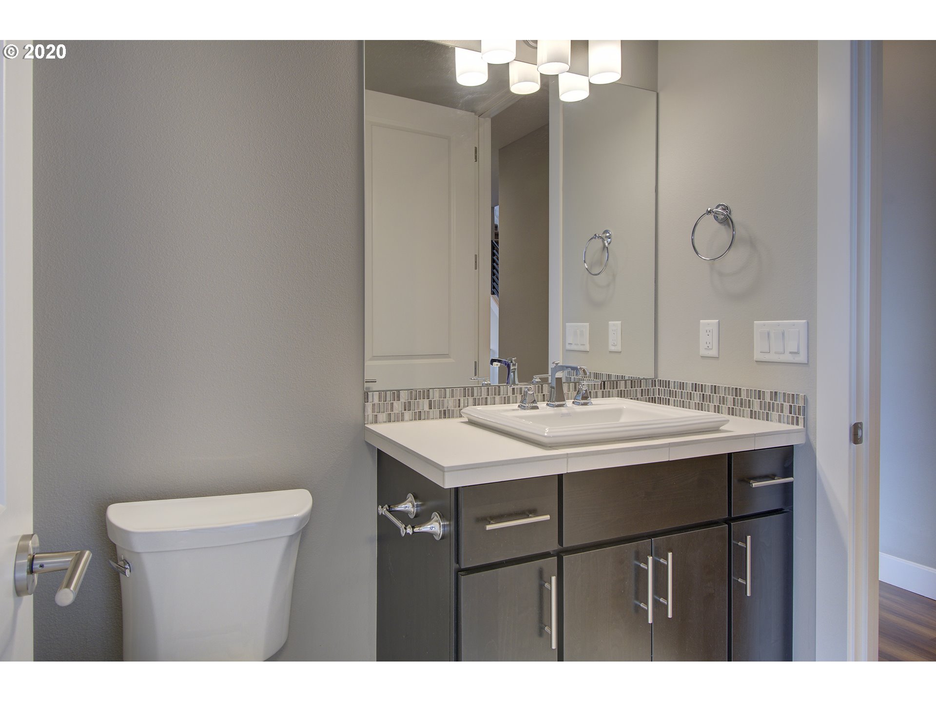 3221 Northwest Lake Place Camas, WA 98607 - Photo 18 of 32 a bathroom with a sink and a mirror