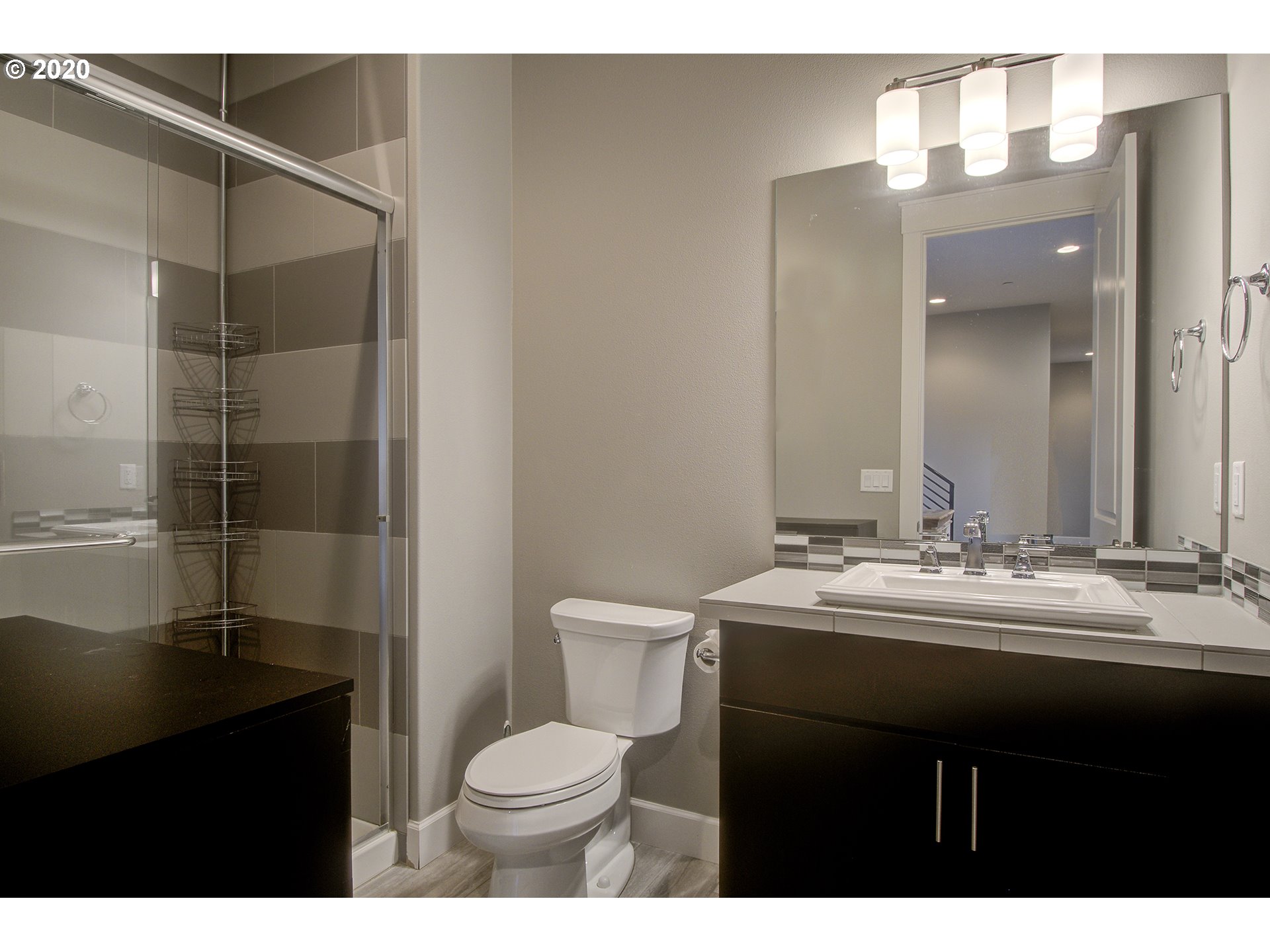 3221 Northwest Lake Place Camas, WA 98607 - Photo 22 of 32 a bathroom with a sink toilet and shower