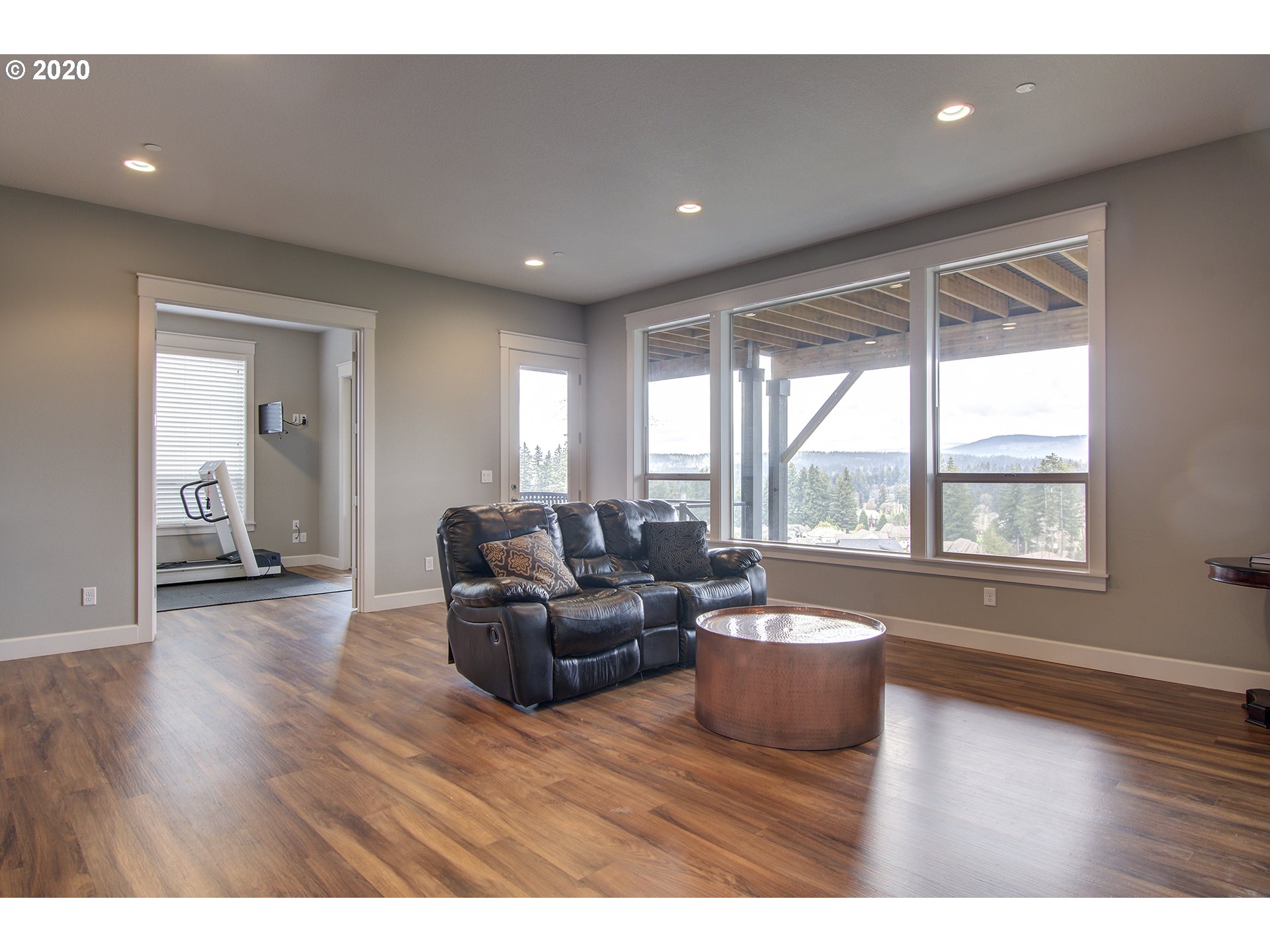 3221 Northwest Lake Place Camas, WA 98607 - Photo 26 of 32 a living room with furniture and a large window