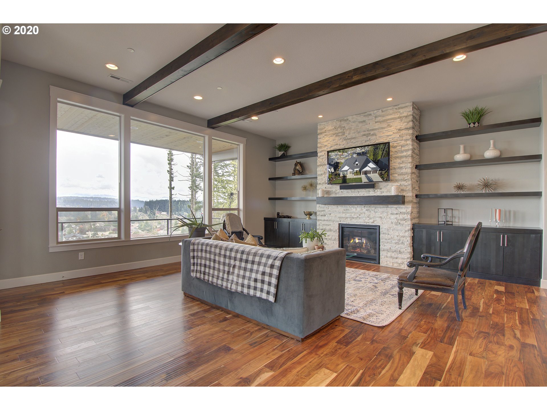 3221 Northwest Lake Place Camas, WA 98607 - Photo 7 of 32 a living room with furniture and a fireplace