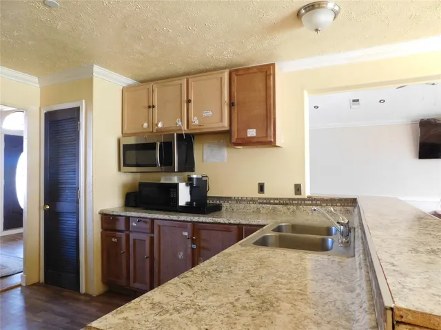 a bedroom with furniture and window