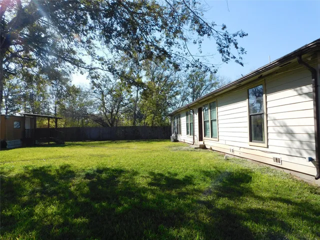 a view of a golf course with a lake