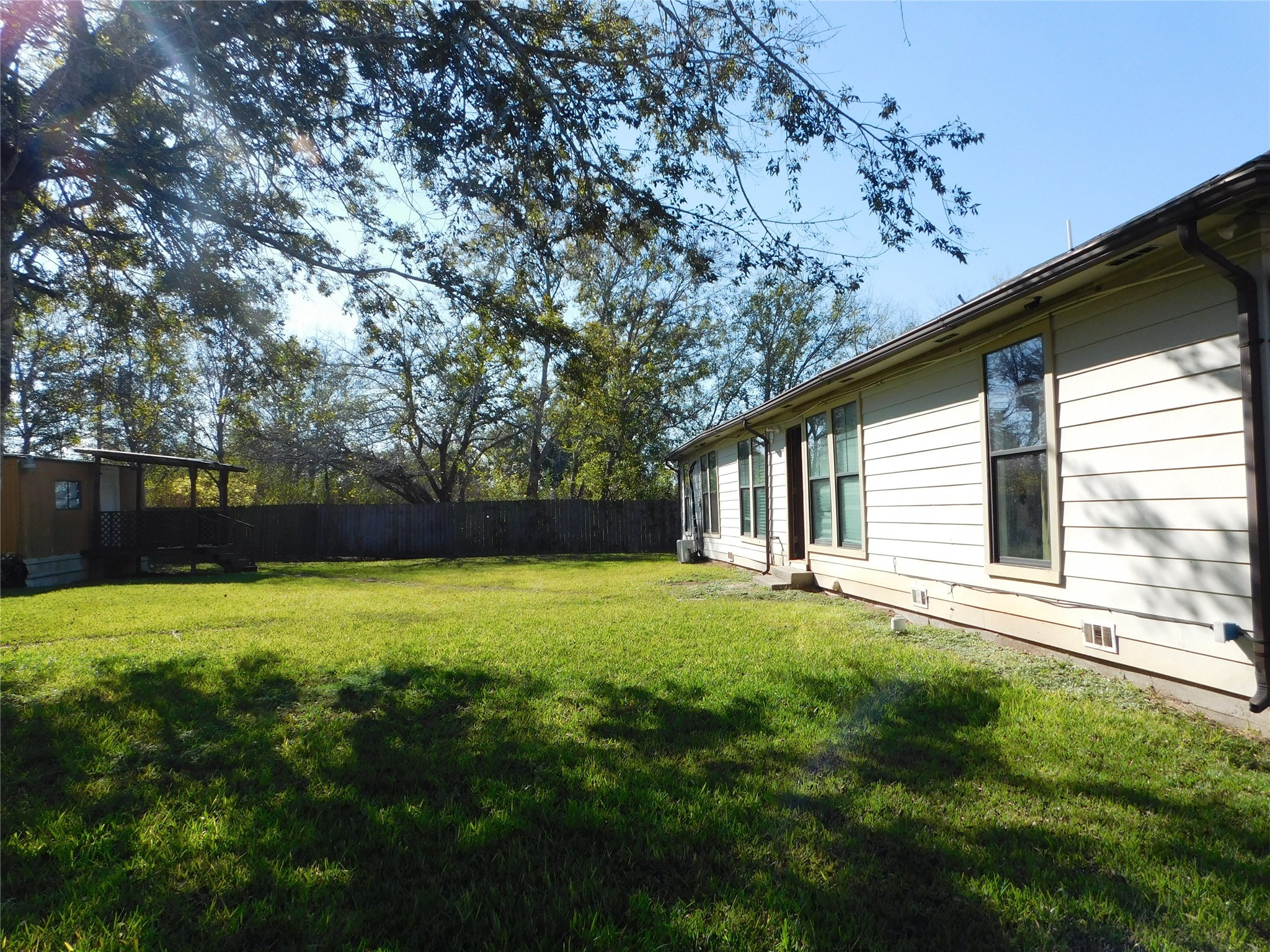 13203 Highway 59 Kendleton, TX 77451 - Photo 32 of 38 a view of a backyard with a garden