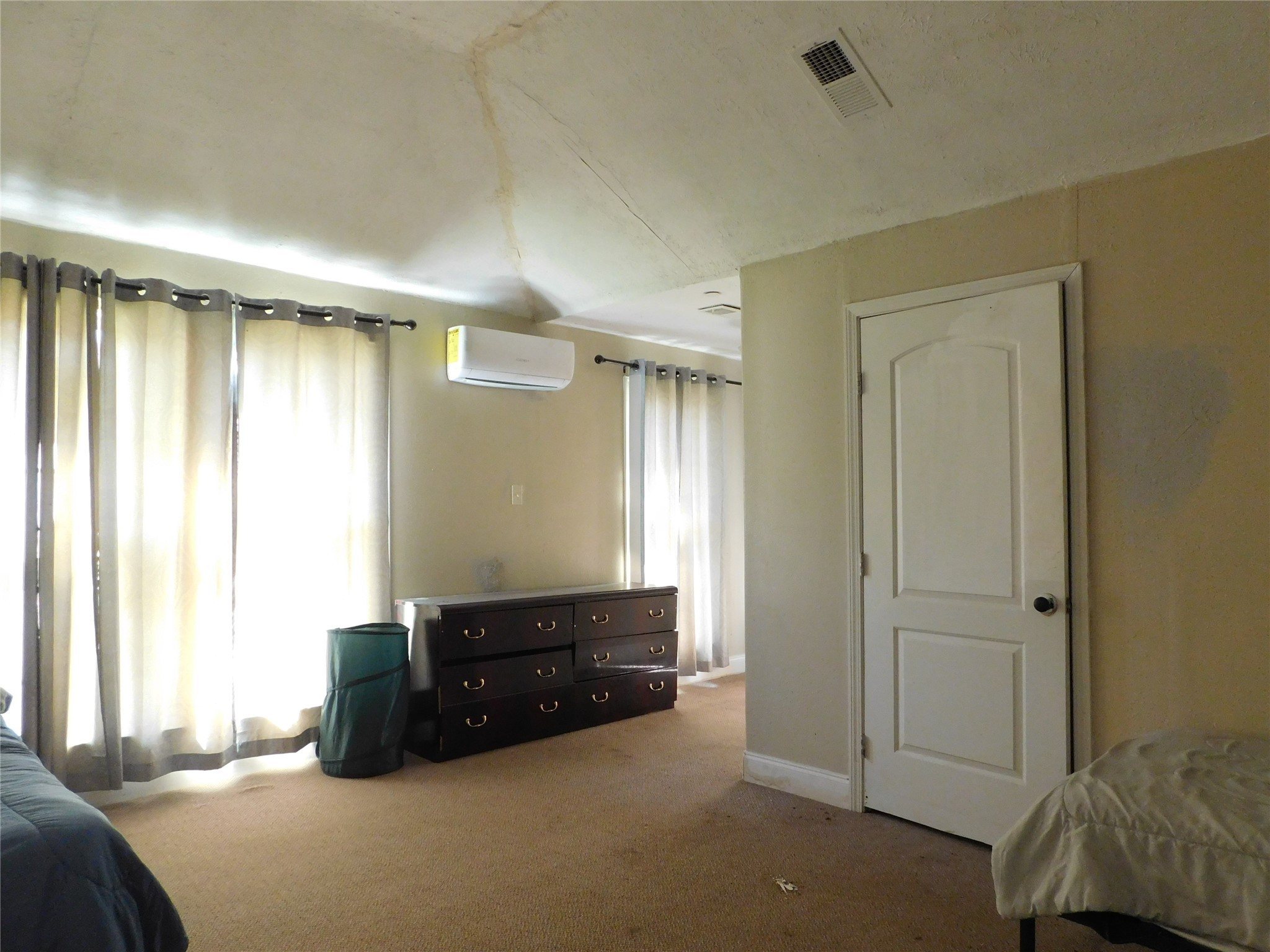 13203 Highway 59 Kendleton, TX 77451 - Photo 9 of 38 a living room with a bed and a window