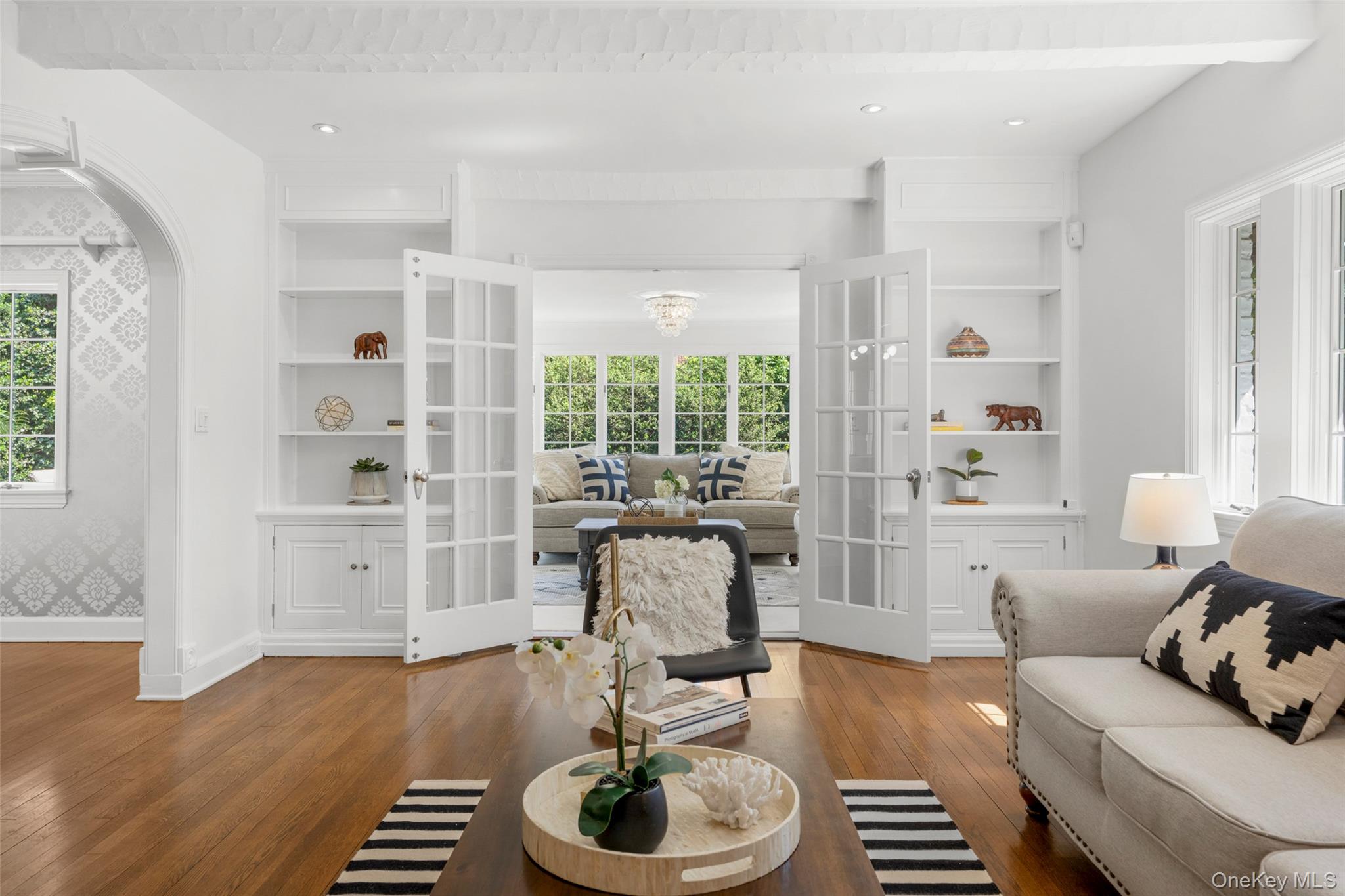 63 Rye Road Rye, NY 10580 - Photo 5 of 50 French doors and built in bookcases lead to a sun filled family room