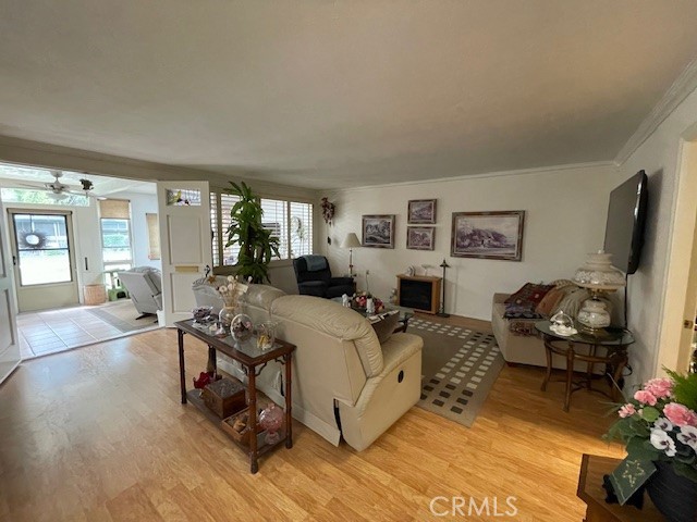 13360 Del Monte Drive, Unit 2B Seal Beach, CA 90740 - Photo 16 of 28 a bed room with furniture and a flat screen tv