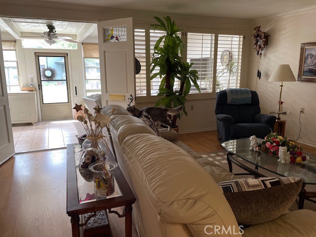 13360 Del Monte Drive, Unit 2B Seal Beach, CA 90740 - Photo 24 of 28 a living room with furniture and a large window