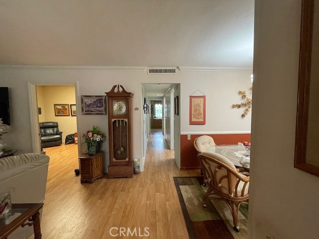 13360 Del Monte Drive, Unit 2B Seal Beach, CA 90740 - Photo 8 of 28 a living room with furniture and a flat screen tv