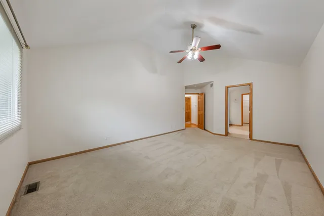 a view of an empty walk in closet