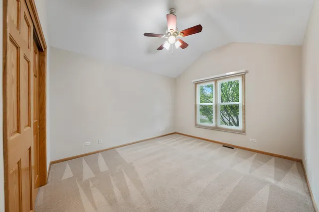 a view of a big room with carpet