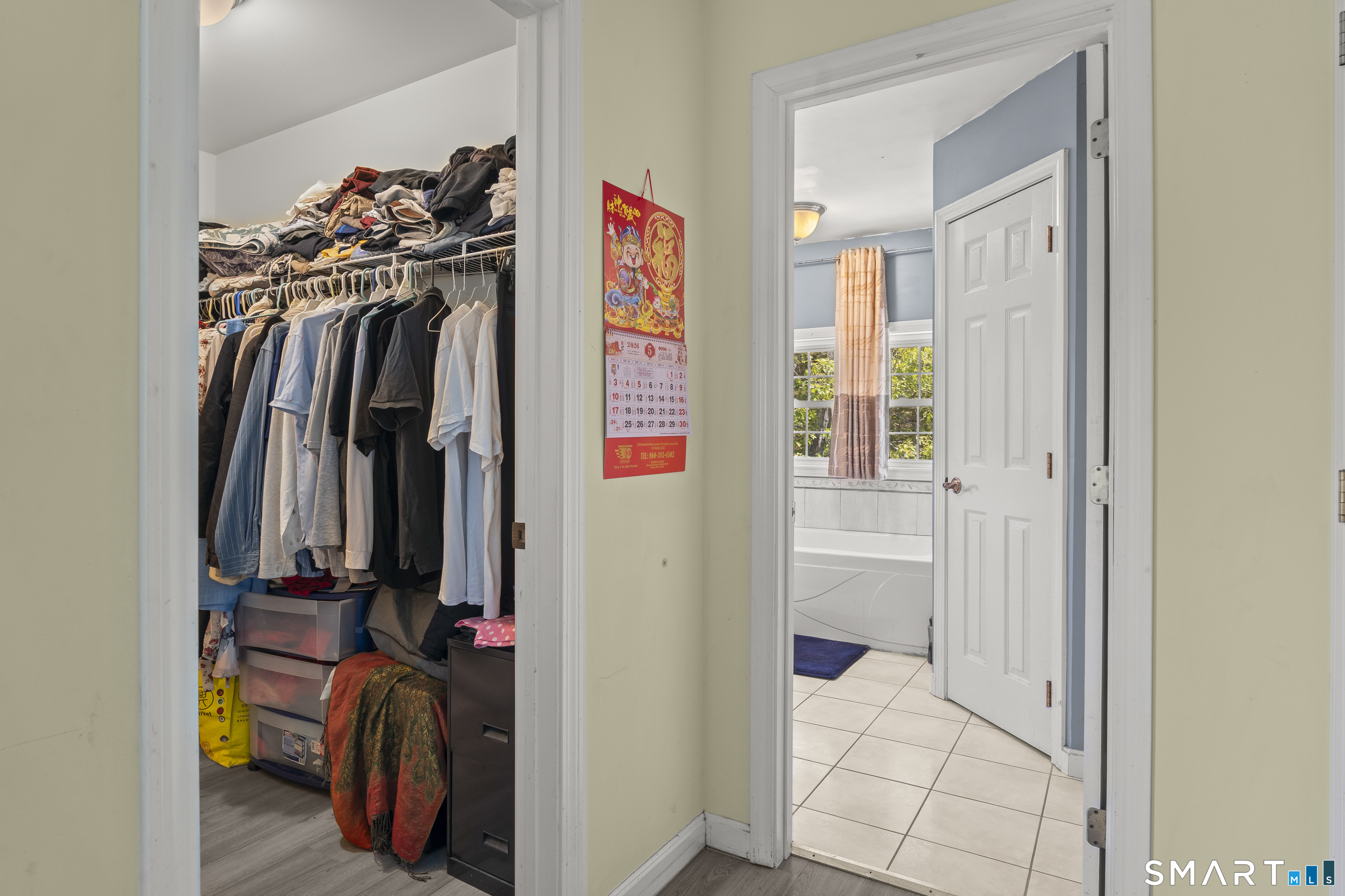 52 Middle Road Preston, CT 06365 - Photo 24 of 39 a view of walk in closet with clothes and shoes