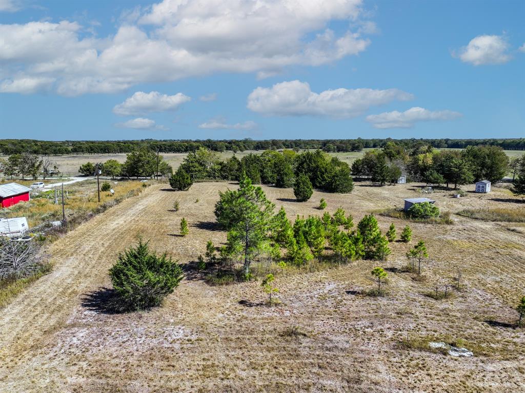 2481 County Road 2130 Cooper, TX 75432 - Photo 17 of 20 a view of a beach with a yard