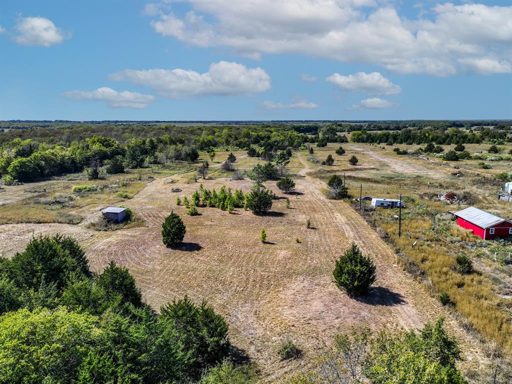 2481 County Road 2130 Cooper, TX 75432 - Photo 18 of 20 a view of a lake with outdoor space