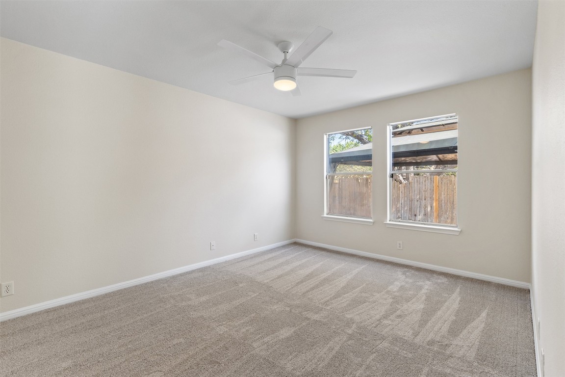 102 Orange Tree Lane Georgetown, TX 78626 - Photo 14 of 31 a view of an empty room with a window
