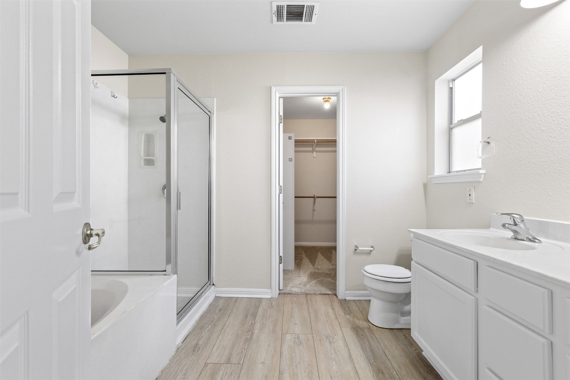 102 Orange Tree Lane Georgetown, TX 78626 - Photo 16 of 31 a bathroom with a sink toilet and shower