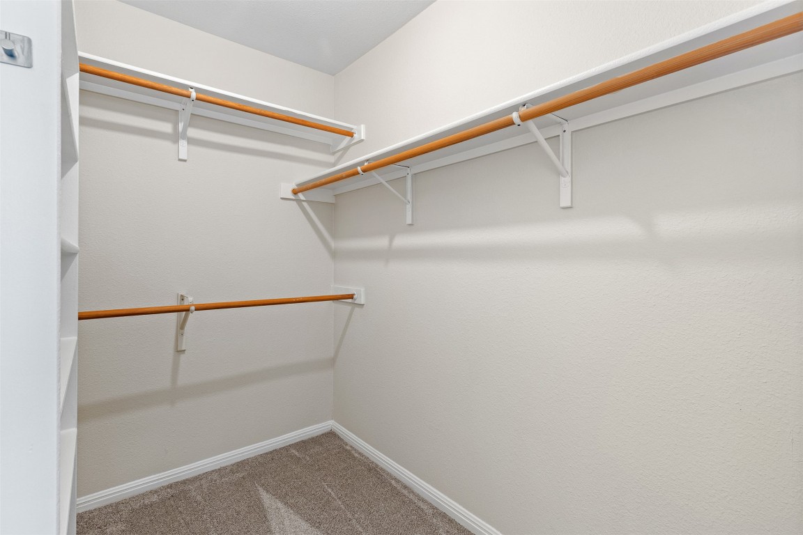 102 Orange Tree Lane Georgetown, TX 78626 - Photo 17 of 31 a view of an empty walk in closet