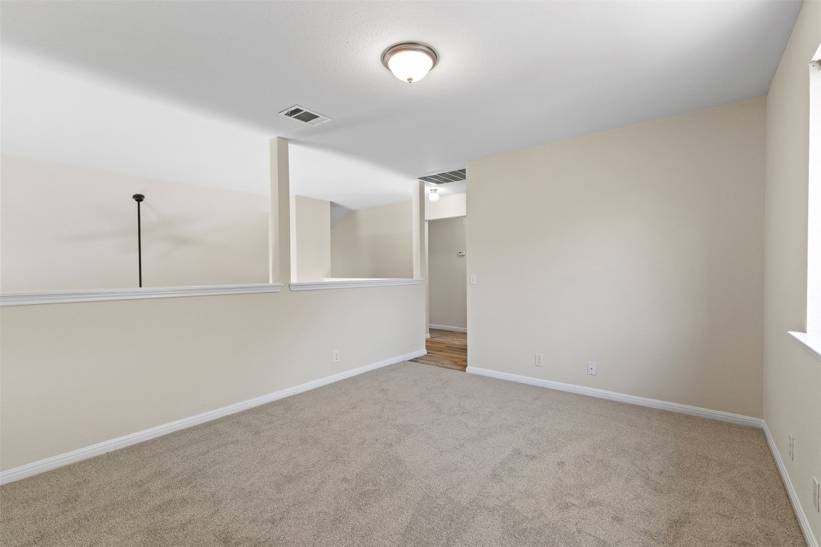 102 Orange Tree Lane Georgetown, TX 78626 - Photo 22 of 31 a view of an empty room
