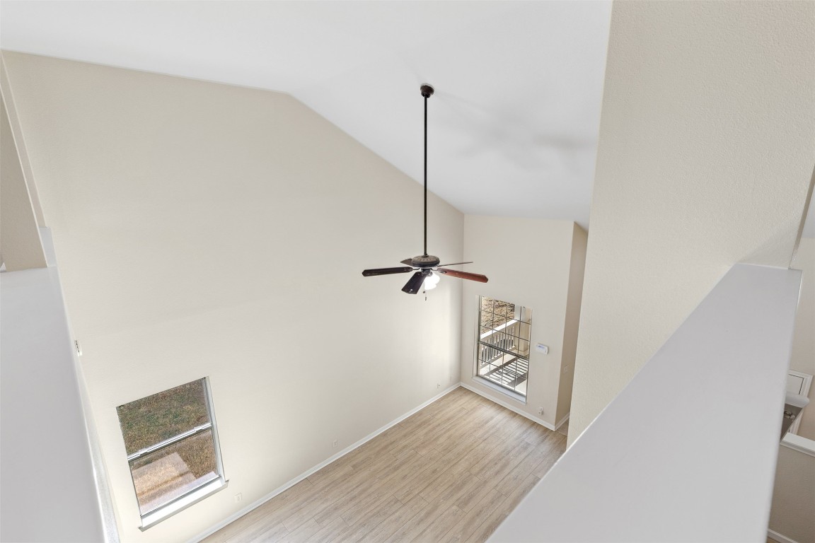 102 Orange Tree Lane Georgetown, TX 78626 - Photo 23 of 31 a view of a hallway with wooden floor