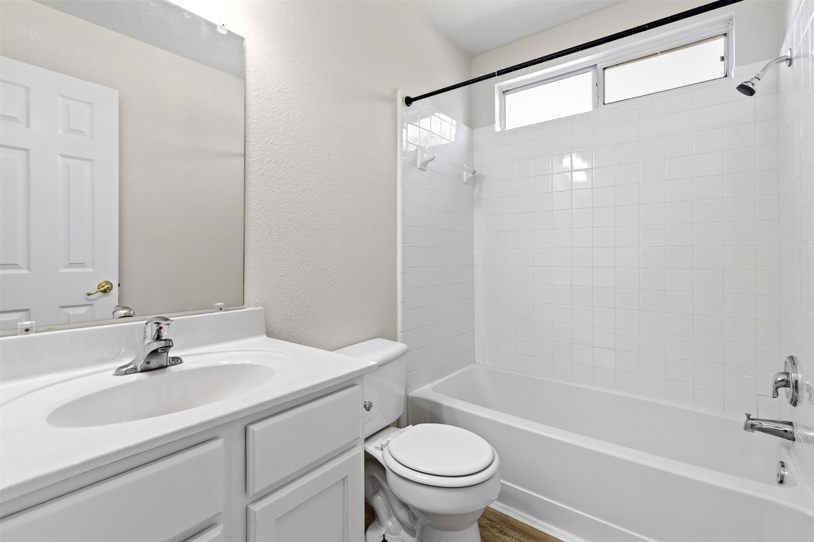 102 Orange Tree Lane Georgetown, TX 78626 - Photo 27 of 31 a bathroom with a sink toilet and shower